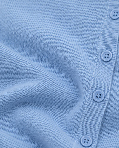 Cárdigan Clásico de Punto Azul – detalle de botones