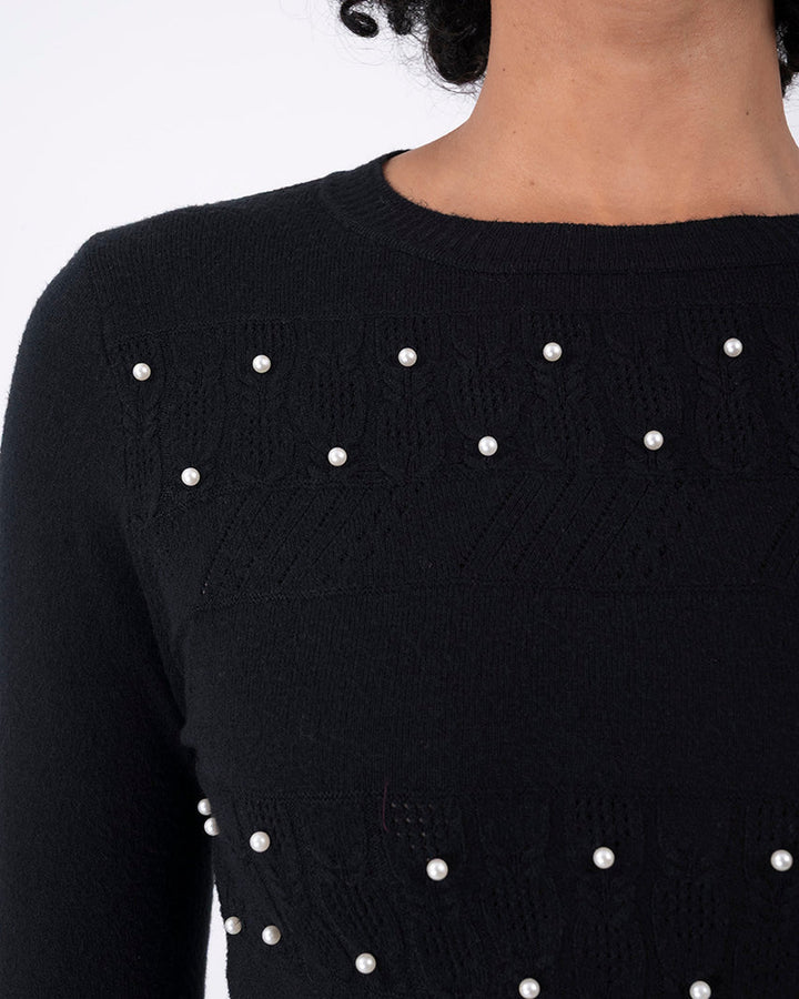 Suéter Elegante con Detalles Negro – detalle de la prenda