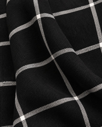 Capa Cuadros con Flecos Negro – detalle de tela