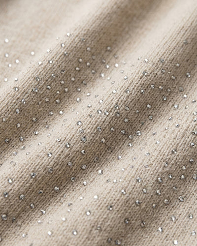 Cárdigan Estola Pompones Beige – detalle de tela