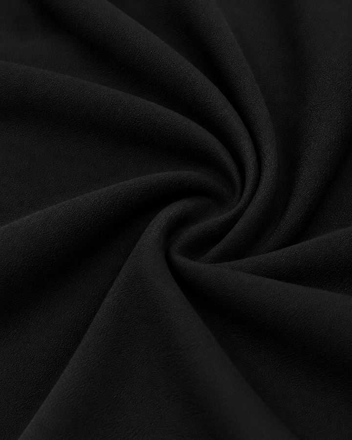 Blusa Drapeada Argolla Dorada Negro – detalle de tela
