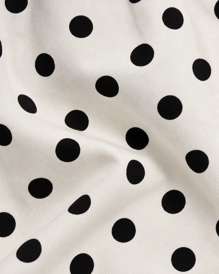 Pantalón Lunares Pierna Ancha Beige – detalle de la tela