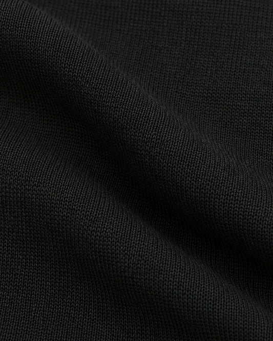 Conjunto Broche Dorado Negro – detalle de tela