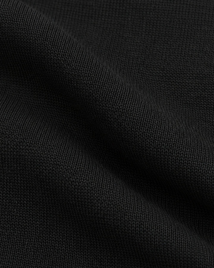 Conjunto Broche Dorado Negro – detalle de tela