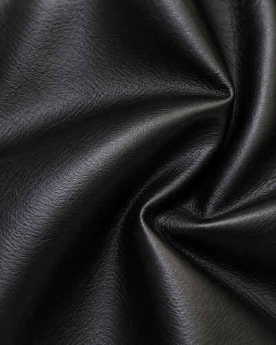 Chamarra Piel Capucha Cordón Negro – detalle de tela