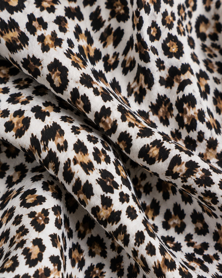 Jumpsuit Animal Print Cinturón Hueso – detalle de tela