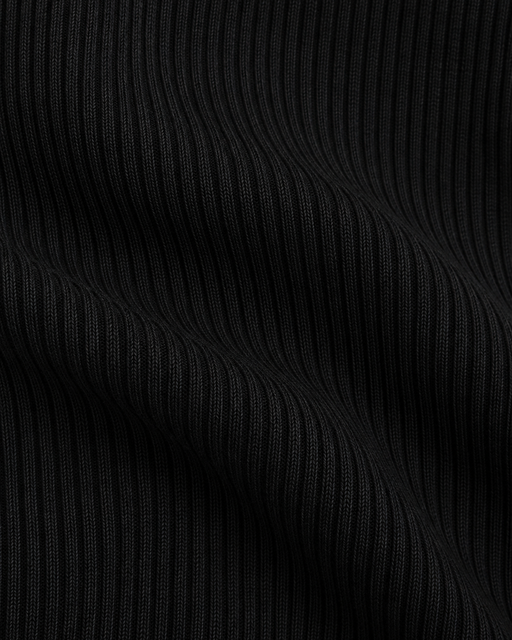 Blusa Canalé Botones Joya Negro – detalle de tela
