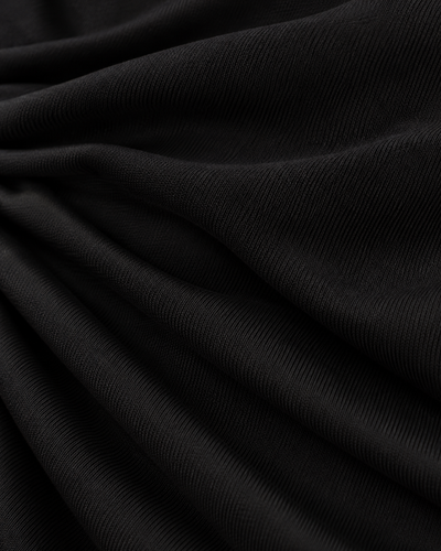 Blusa Drapeada Hombreras Negro – detalle de tela